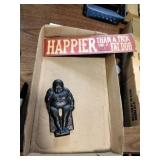 Cast Iron Buddha and Metal Sign