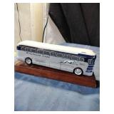 Wooden Greyhound Bus on Pedestal