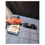 3 Die-cast Cars and 1 Plastic Model