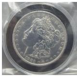 1883-O Morgan silver dollar.