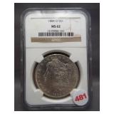 1884-O Morgan silver dollar. NGC MS62.