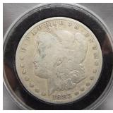 1883-O Morgan silver dollar.