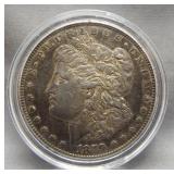 1879-S Morgan silver dollar. Nice toning.