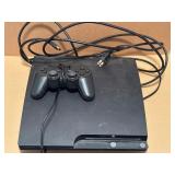 Sony PlayStation 3 Slim console with a controller