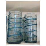 (4) Hand Blown glass tumbler with an aqua blue