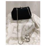 Black Hard Shell Statement Clutch with a Silver