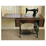 34.5ï¿½x18ï¿½x28" VTG Treadle Sewing Machine in a