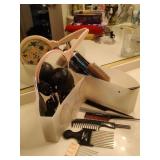 Hairstyling tools and suction cup holders