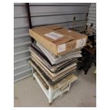 A bunch of carpet square samples Some stained and