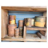 Various size vintage lubricant and oil cans