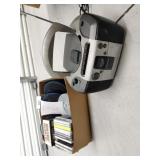 Box of CDs , CD Cases and an plug in CD/tape Boom