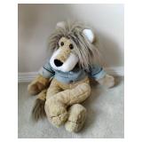 Stuffed Lion Puppet in a Denim Jacket