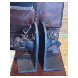 A Pair of cast iron deer head bookends 7"