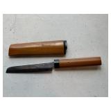 Japanese fruit knife with a wooden handle and