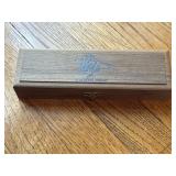 A Collectible wooden box engraved with "Blackfeet