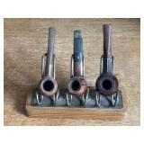 A Set of VTG estate tobacco pipes displayed on a