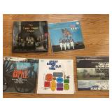 VTG vinyl record albums with musical themes