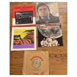 Assorted vintage vinyl records.