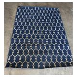 63"x88" Blue Area Rug Featuring a Cream