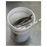 Bucket Containing Stainless Steel Banding Straps