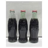 (3) Classic 8 oz "Hobbleskirt" Style bottles,