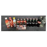 Full Glass Coke Bottles along w/Special Editions