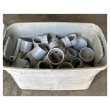 Tote filled W/ assorted PVC pipe fittings and