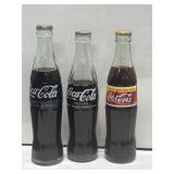 (3) V Coca-Cola Glass Bottles from