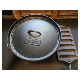 New Outdoor Gourmet Cast Iron Dutch Oven with a