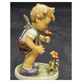 Goebel Hummel figurine titled 'The Florist,'