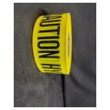 Roll of Yellow ' CAUTION HYDROBLASTING' workers
