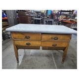 Antique Baker's Table features a Prominent,
