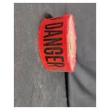 Roll of Red ' DANGER HYDROBLASTING' workers Tape