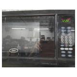 Oster Black Digital Countertop Microwave Oven