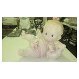 Porcelain Baby Figurine with Blonde Hair, Wearing