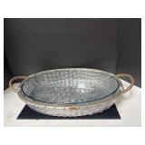 A vintage woven metal casserole serving basket,