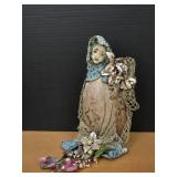 Lady Made on a Large Conch Shell