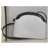 Structured White Handbag with a Black Curved Top
