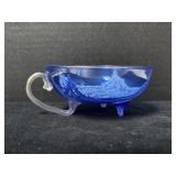 A vintage cobalt blue coffee/tea Cup  featuring