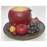 Apple Shaped Candle Holder Sitting on a Woven