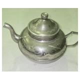 Engraved Metal Teapot with Intricate Traditional