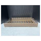 A  decorative rectangular serving tray featuring