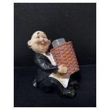 A decorative polyresin French/Italian chef or