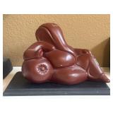 Reclining Ganesha Sculpture Resting on Display