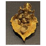 Lord Ganesh Idol Ganesha on Leaf With Diya Hand