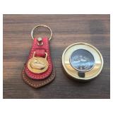Dooney & Bourke All-Weather Leather (AWL) Brass
