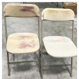 pair folding chairs, plastic seats, metal frames