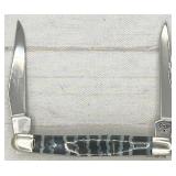 2009 CaseXX Tiny Muskrat knife in presentation