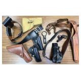 assorted holsters & belts