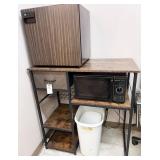 frig, microwave, stand, table, trash cans